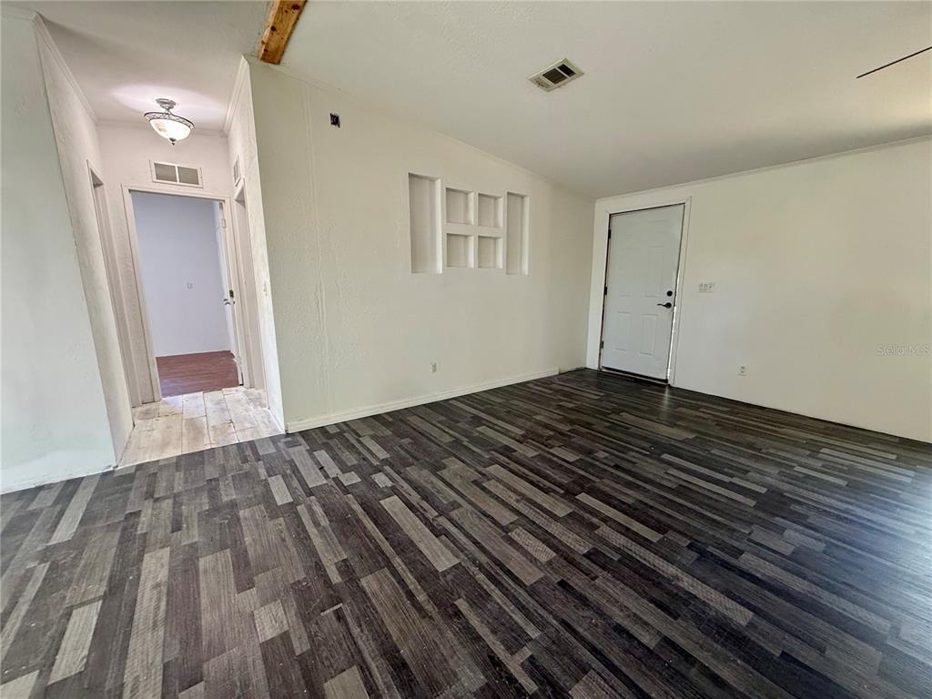 21471 Northwest 172nd Road High Springs, FL 32643 - Photo 6 of 26 a view of empty room with wooden floor