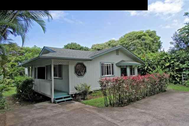 560 West Kuiaha Road Haiku, HI 96708 - Photo 1 of 23 a front view of a house with garden
