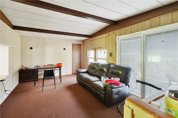 a living room with furniture and a couch