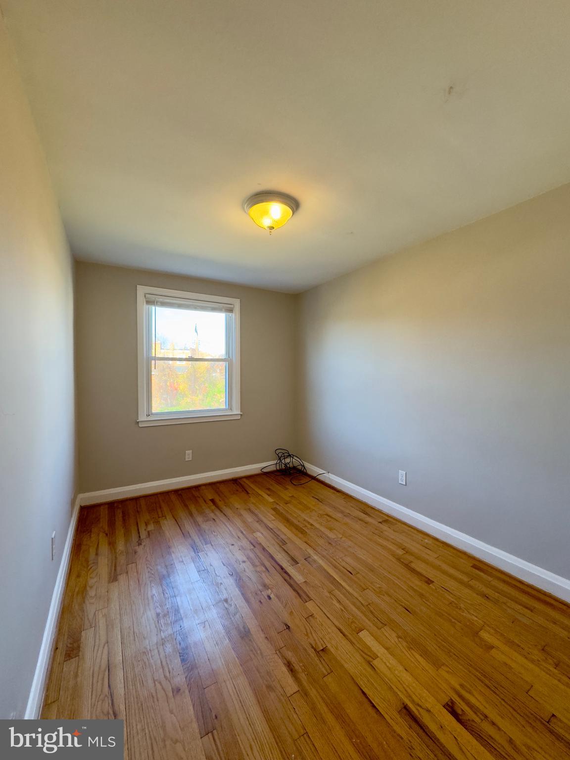 3710 Springwood Avenue Baltimore, MD 21206 - Photo 17 of 24 a view of an empty room and window