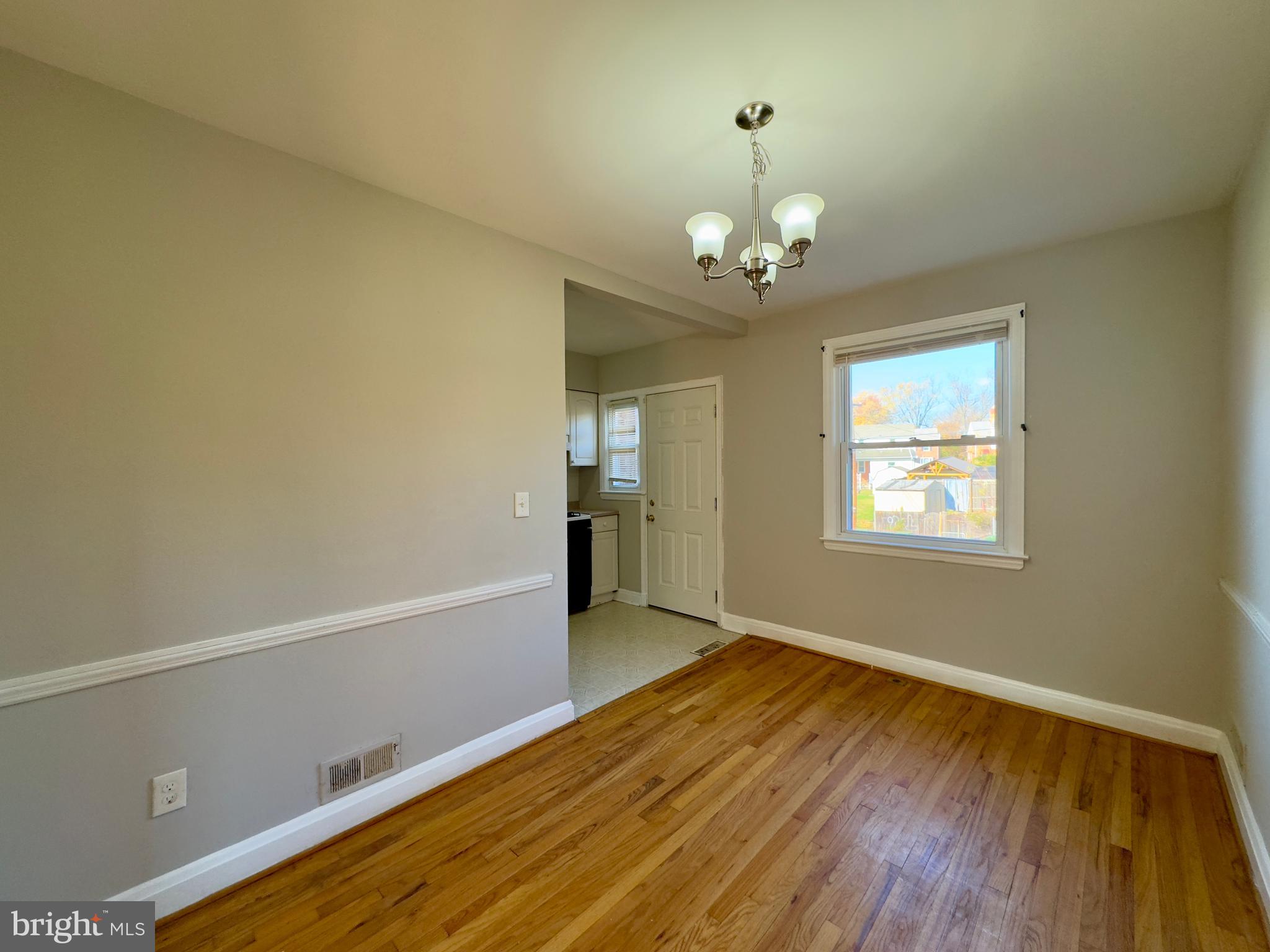 3710 Springwood Avenue Baltimore, MD 21206 - Photo 9 of 24 a view of an empty room with a window