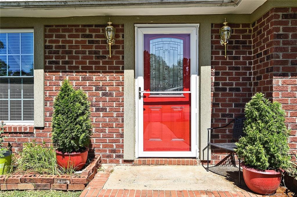 7101 Riding Trail Road, Unit 1 Charlotte, NC 28212 - Photo 2 of 14 a front view of a house