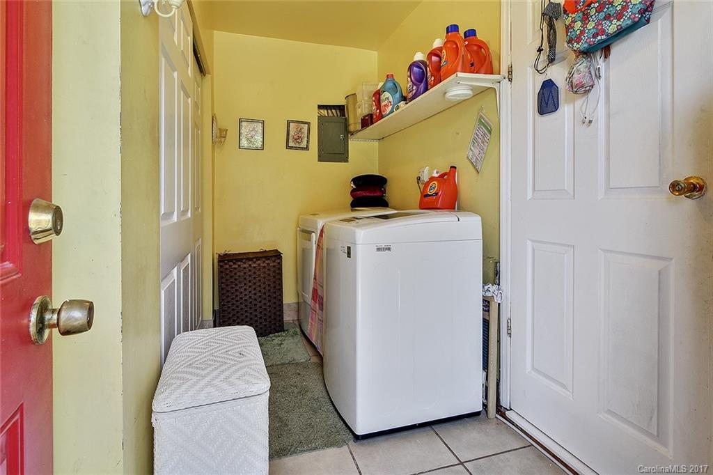 7101 Riding Trail Road, Unit 1 Charlotte, NC 28212 - Photo 12 of 14 a utility room with dryer and washer