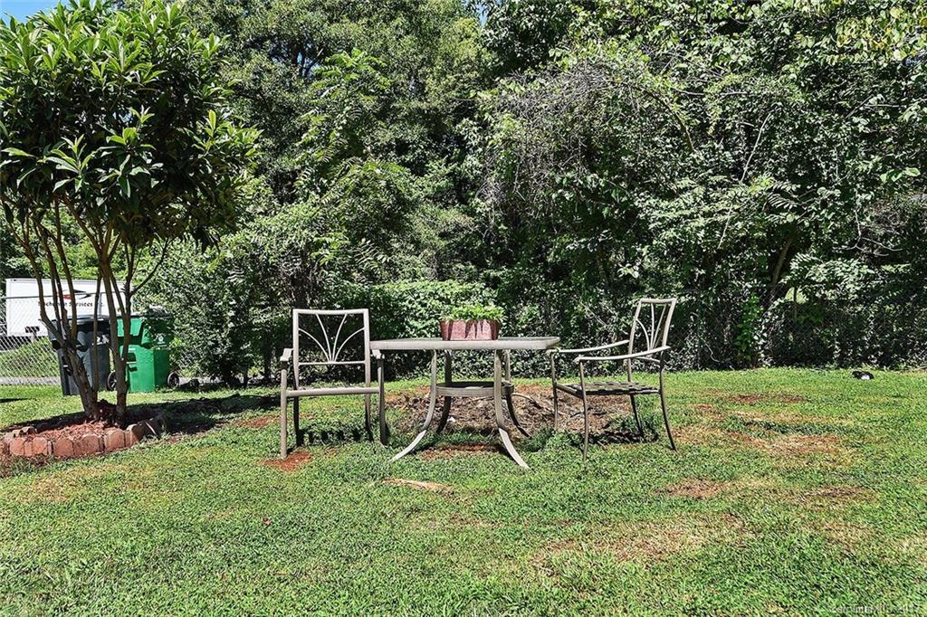 7101 Riding Trail Road, Unit 1 Charlotte, NC 28212 - Photo 14 of 14 a view of backyard with deck and backyard