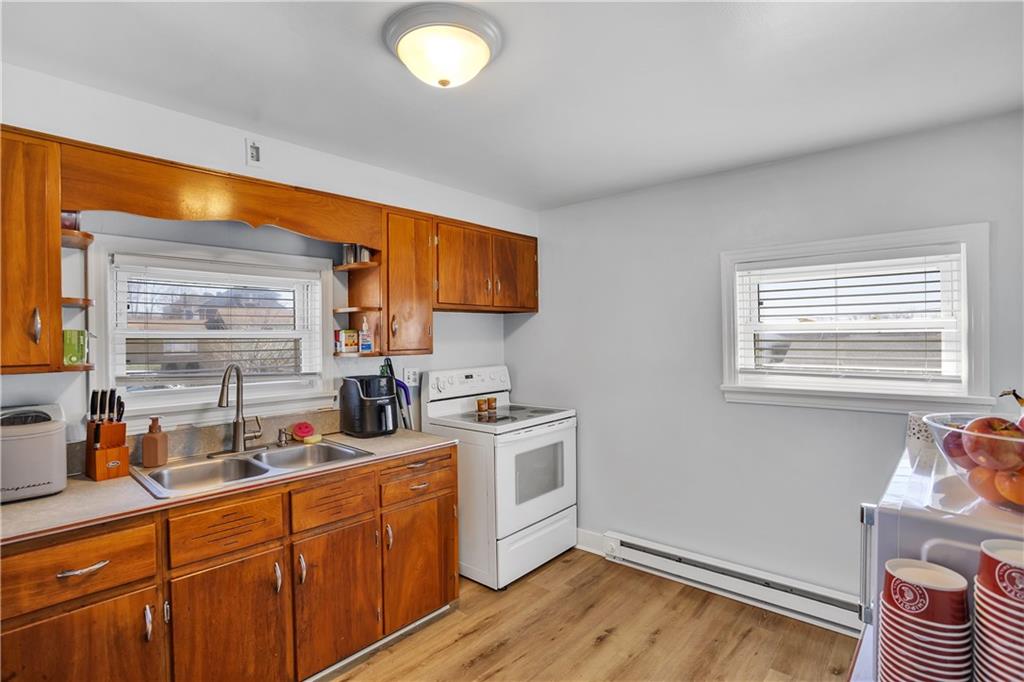 804 George Street Scottdale, PA 15683 - Photo 29 of 34 Spacious kitchen, double sink. Electric Stove and Refrigerator included