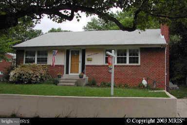 3603 May Street Silver Spring, MD 20906 - Photo 1 of 1 a front view of a house with a garden and plants
