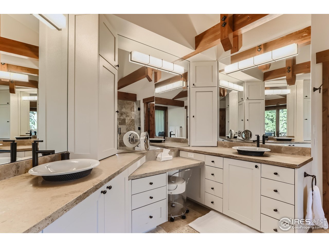 2307 Magnolia Road Nederland, CO 80466 - Photo 13 of 40 a bathroom with a sink and a mirror