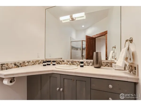a kitchen with a sink cabinets and window