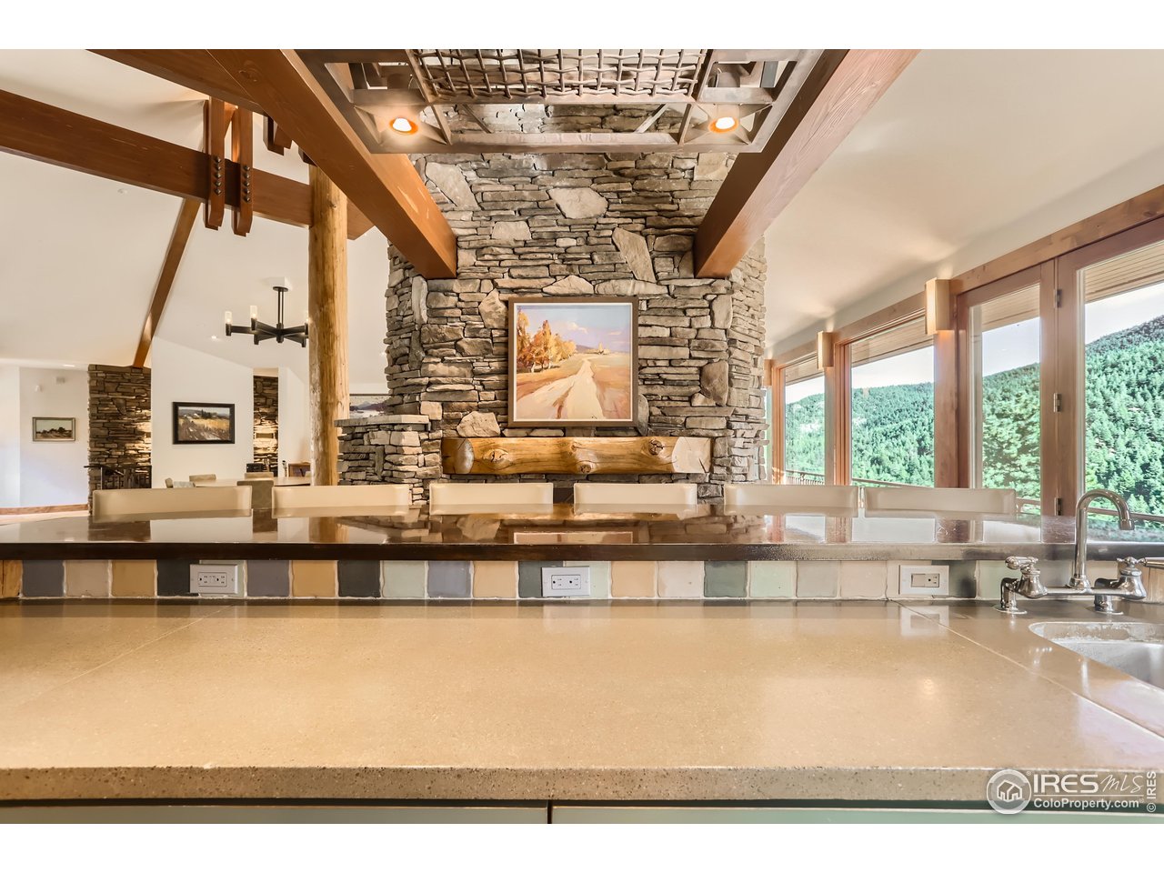 2307 Magnolia Road Nederland, CO 80466 - Photo 5 of 40 a large white building with a view of swimming pool