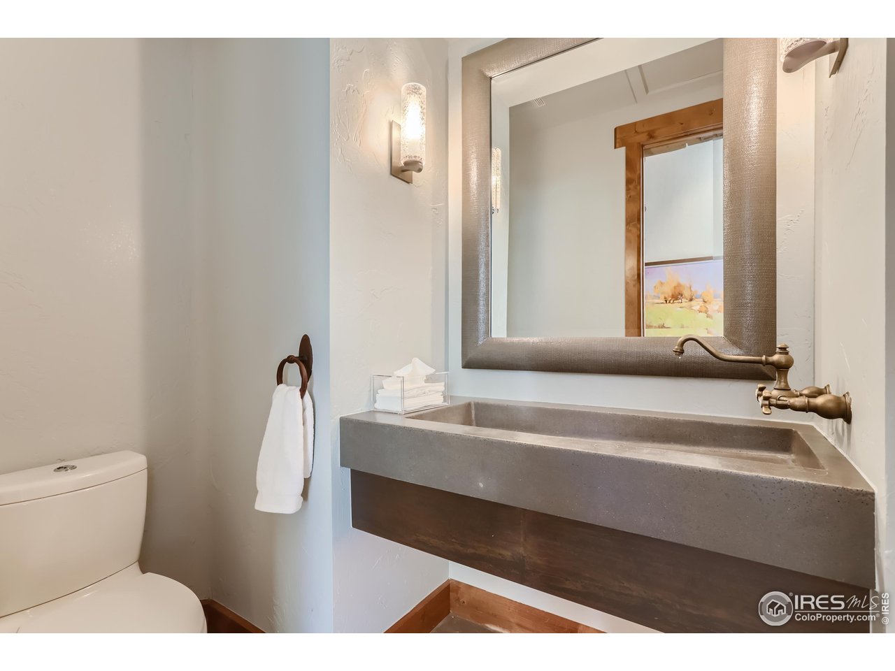 2307 Magnolia Road Nederland, CO 80466 - Photo 10 of 40 a bathroom with a sink and a mirror