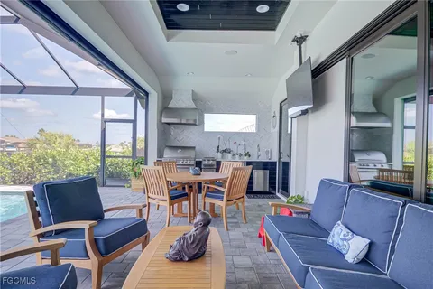 a dining room with furniture window and wooden floor