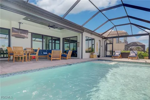 a living room with furniture and a table