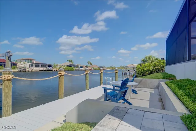 a view of a terrace with furniture and stove