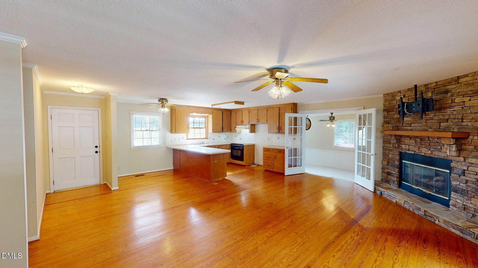 2805 Redwood Road Durham, NC 27704 - Photo 13 of 26 a view of a livingroom with a fireplace