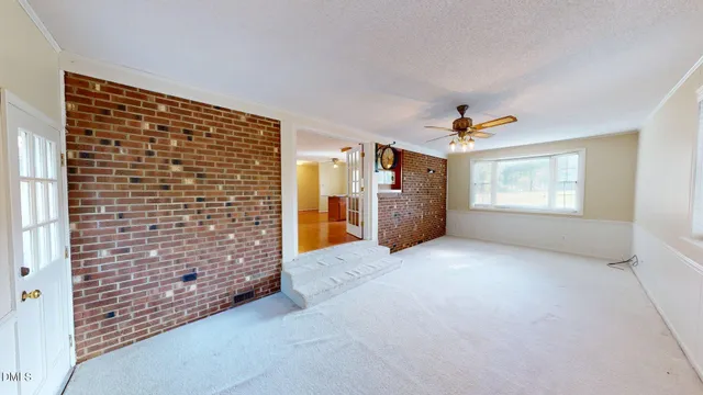 a large kitchen with stainless steel appliances granite countertop a sink stove and cabinets