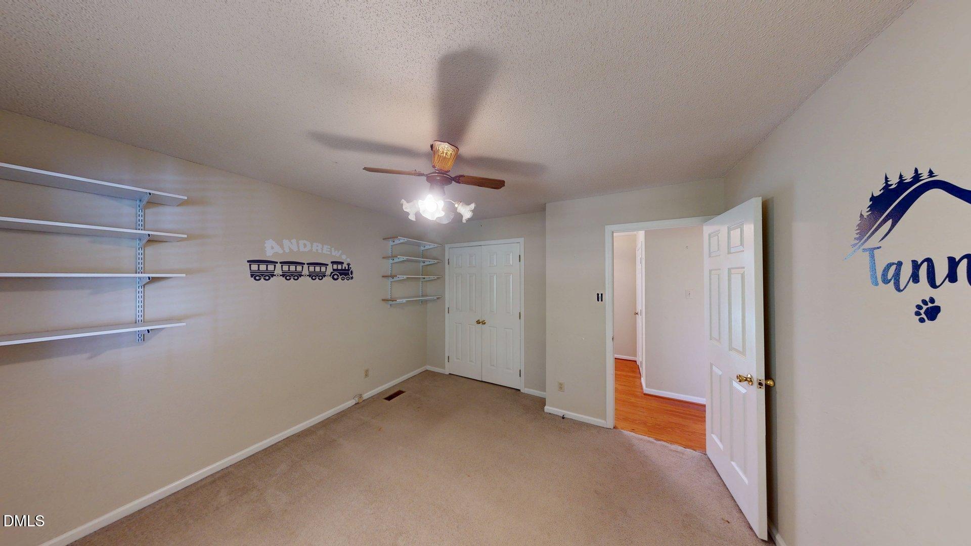 2805 Redwood Road Durham, NC 27704 - Photo 19 of 26 a view of a livingroom with an empty space