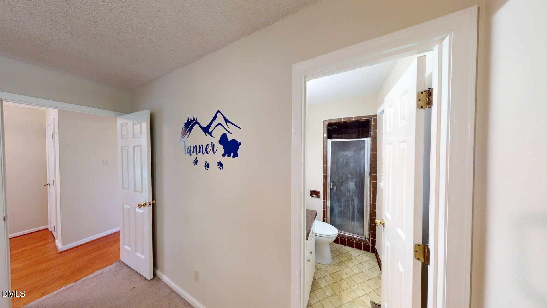 2805 Redwood Road Durham, NC 27704 - Photo 20 of 26 a view of a hallway with bathroom
