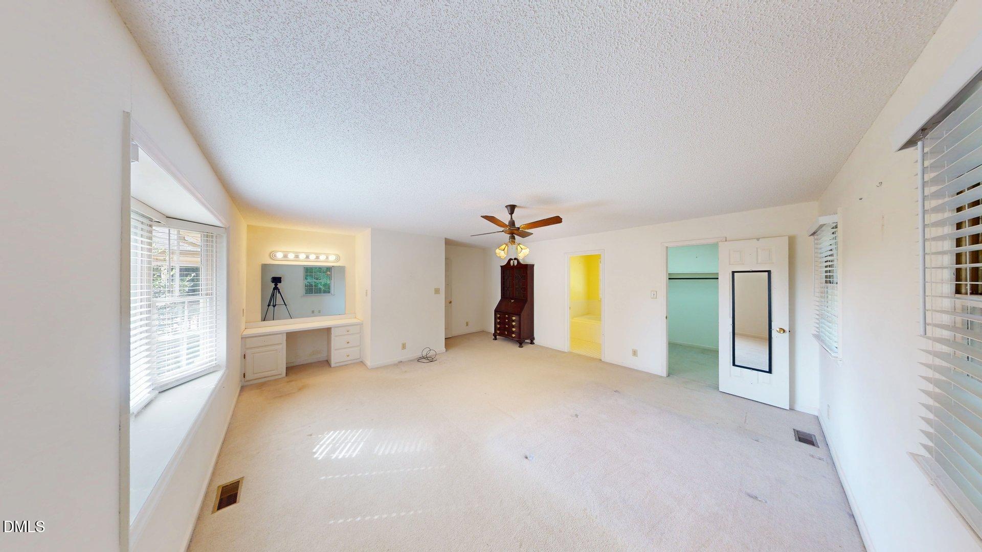 2805 Redwood Road Durham, NC 27704 - Photo 24 of 26 a view of a livingroom with a staircase