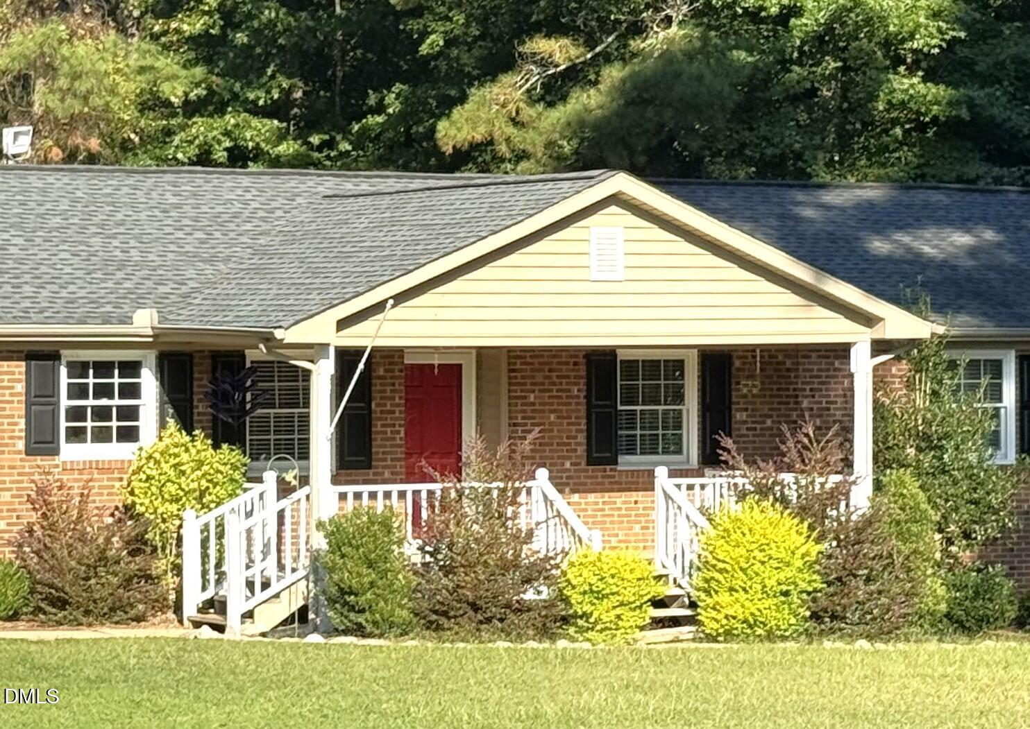 2805 Redwood Road Durham, NC 27704 - Photo 3 of 26 front view of a house with a yard