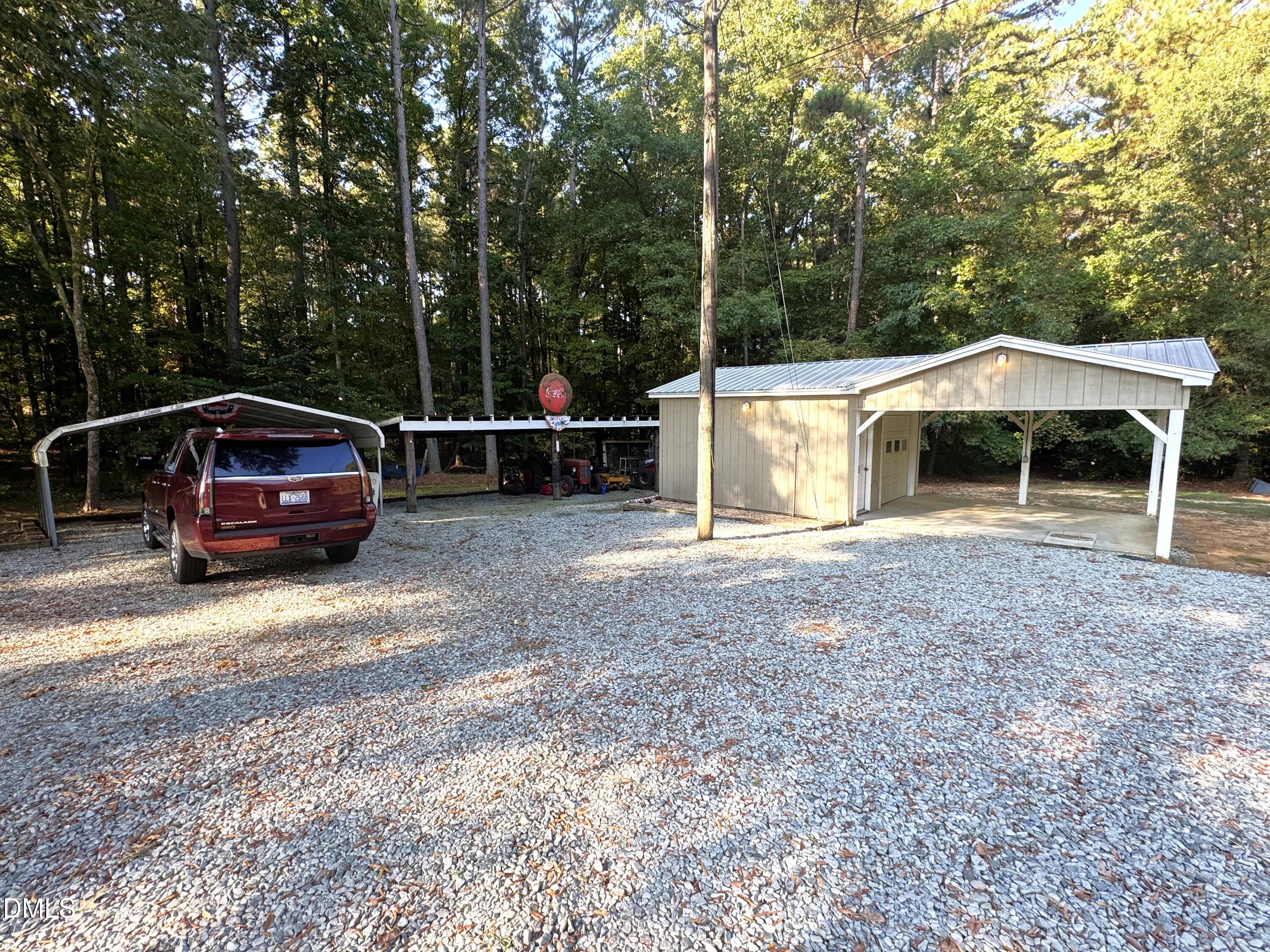 2805 Redwood Road Durham, NC 27704 - Photo 6 of 26 a view of a car parked in front of a house