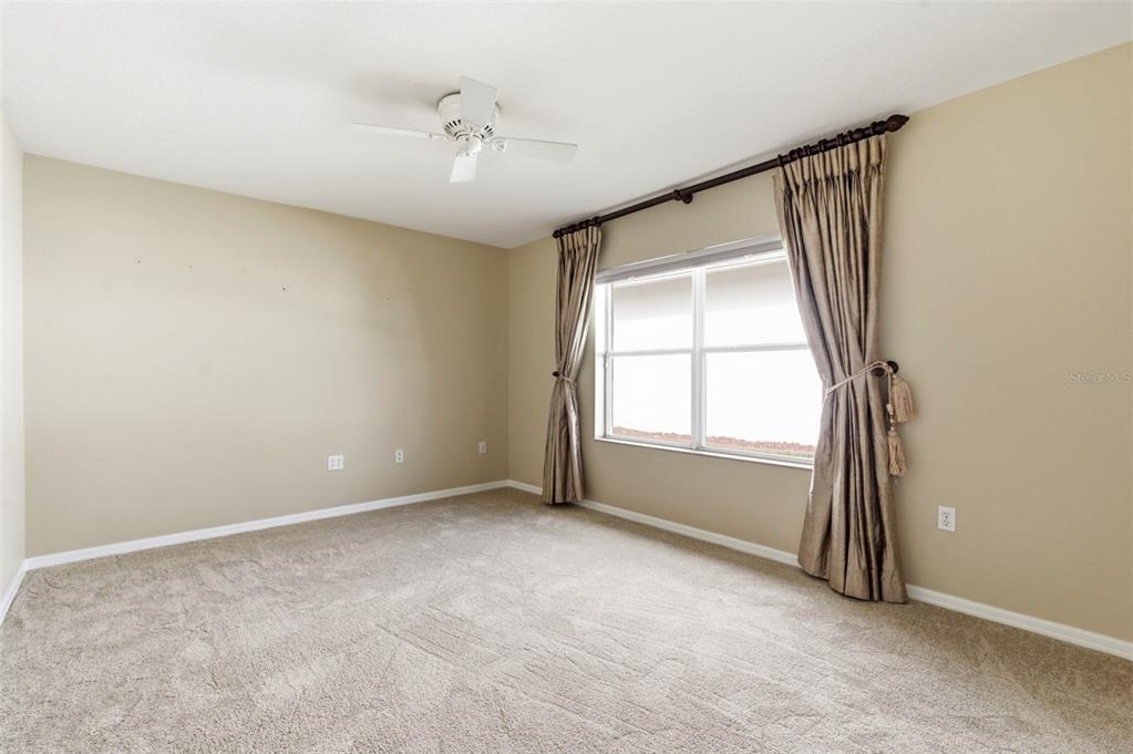 1450 Warrington Way Trinity, FL 34655 - Photo 32 of 62 a view of an empty room with a window