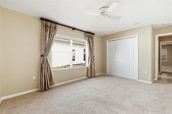 a view of a swimming pool with a porch