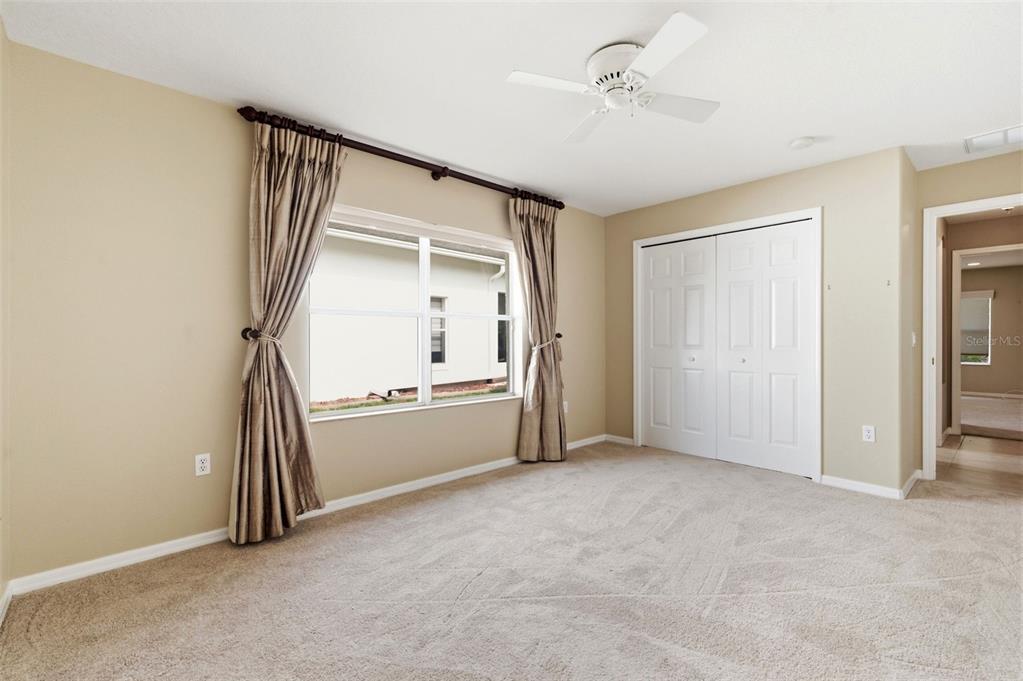 1450 Warrington Way Trinity, FL 34655 - Photo 34 of 62 an empty room with windows