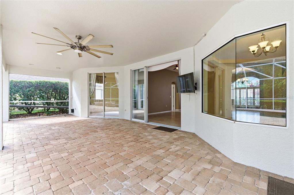 1450 Warrington Way Trinity, FL 34655 - Photo 38 of 62 a view of empty room with wooden floor and fan