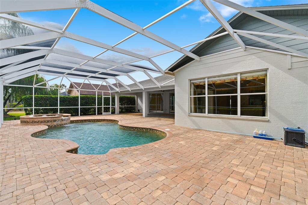 1450 Warrington Way Trinity, FL 34655 - Photo 44 of 62 a view of a house with a backyard