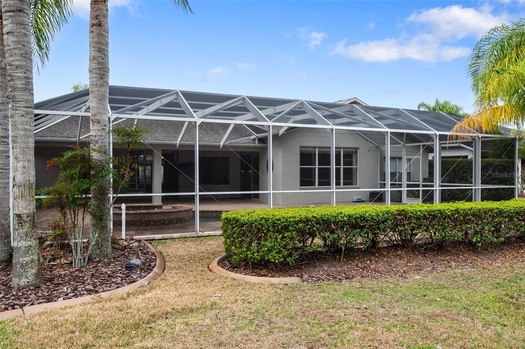1450 Warrington Way Trinity, FL 34655 - Photo 49 of 62 a house view with a garden space