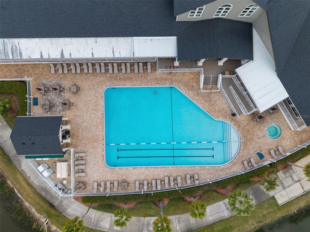 1450 Warrington Way Trinity, FL 34655 - Photo 54 of 62 a view of kitchen with stainless steel appliances granite countertop a stove and a dining table