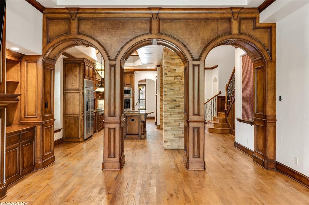 18231 Brighton Green Dallas, TX 75252 - Photo 13 of 36 a view of hall with wooden floor