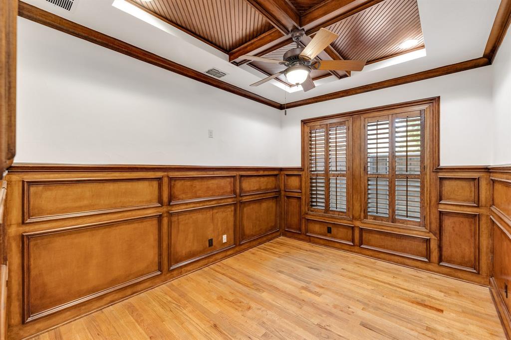 18231 Brighton Green Dallas, TX 75252 - Photo 17 of 36 a view of a hardwood & staircase in an empty room