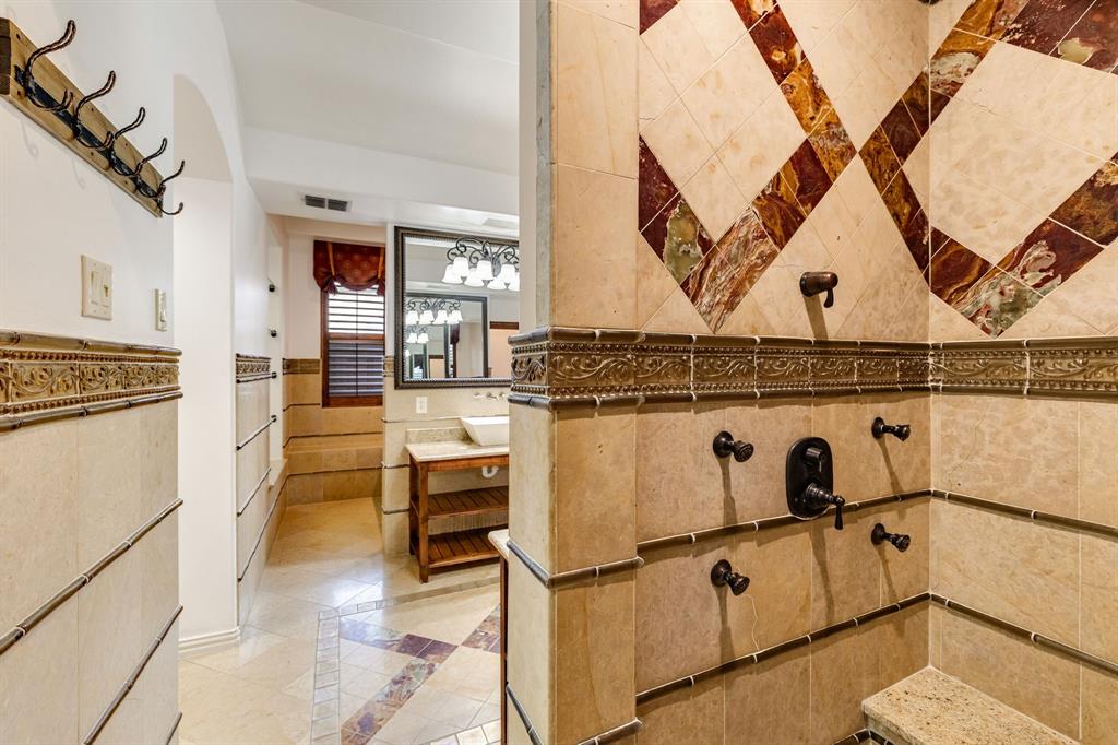 18231 Brighton Green Dallas, TX 75252 - Photo 24 of 36 a view of kitchen with washer and dryer