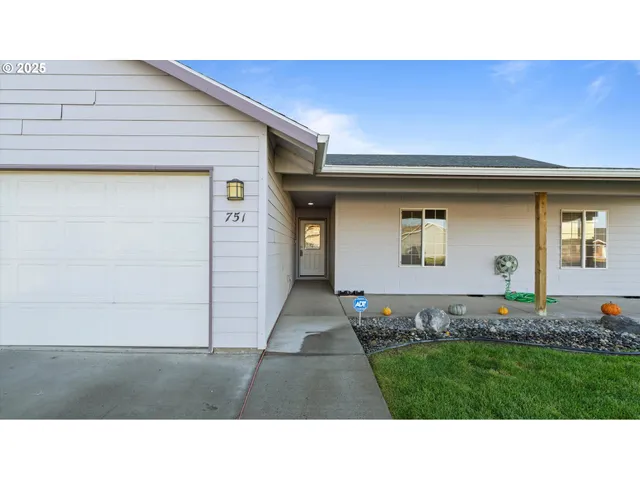 a black and white photo of a house