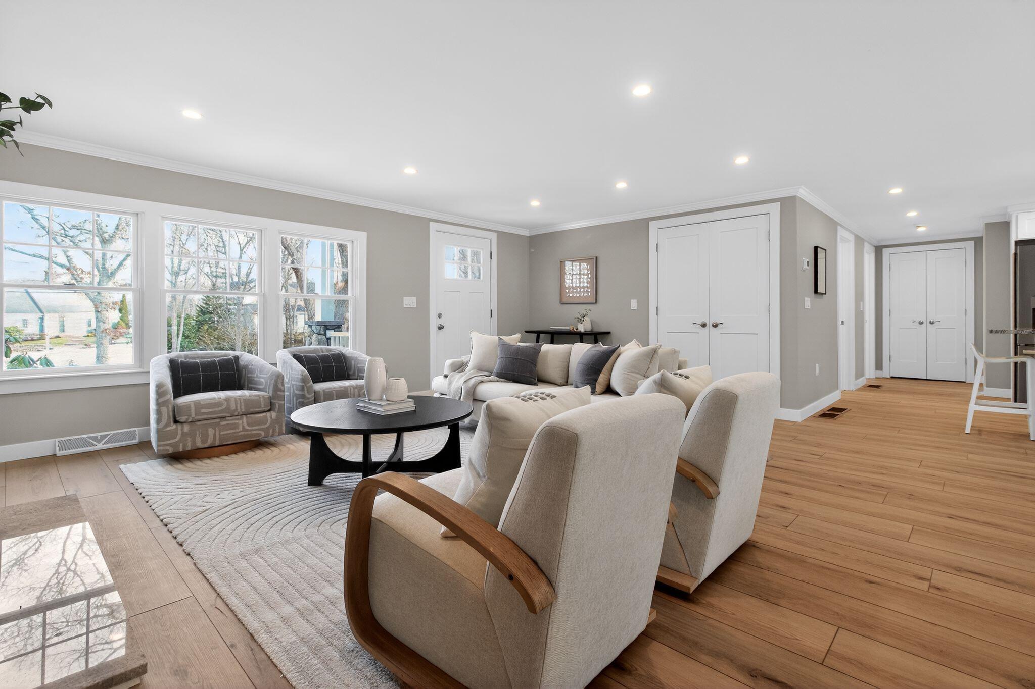 53 Eel River Road East Falmouth, MA 02536 - Photo 12 of 42 a living room with furniture and a large window