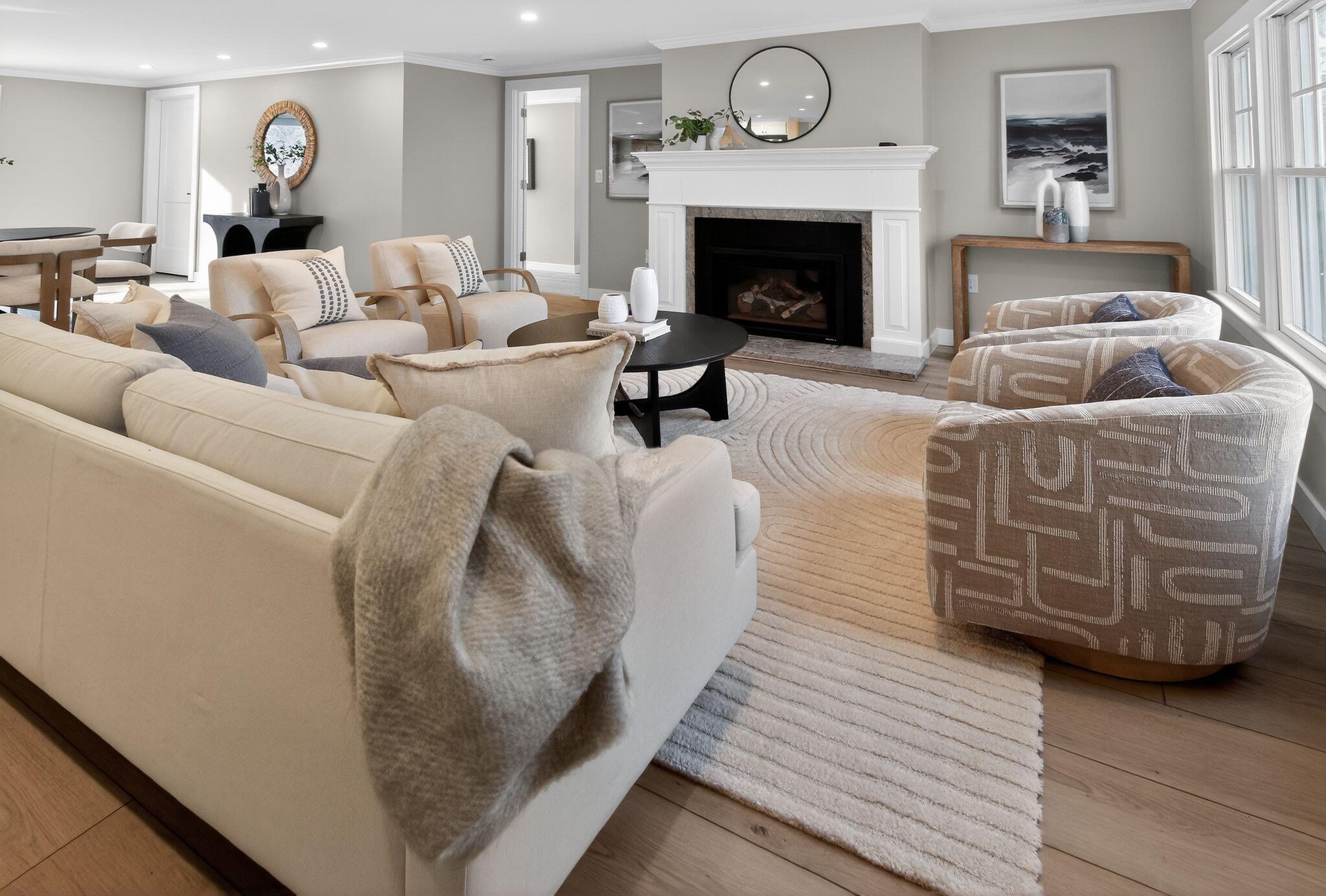 53 Eel River Road East Falmouth, MA 02536 - Photo 15 of 42 a living room with furniture and a fireplace