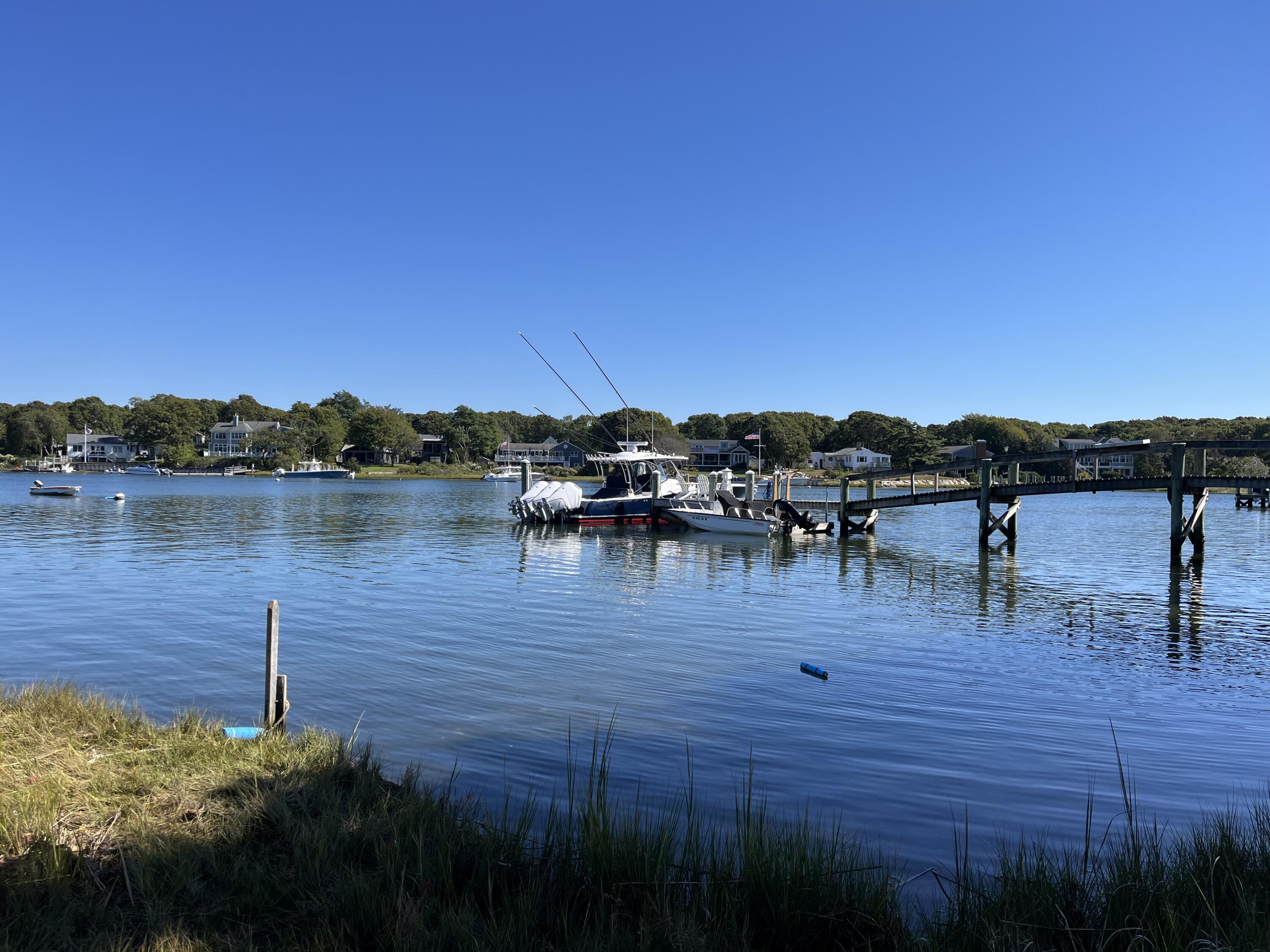 53 Eel River Road East Falmouth, MA 02536 - Photo 5 of 42 a view of a lake with outdoor space