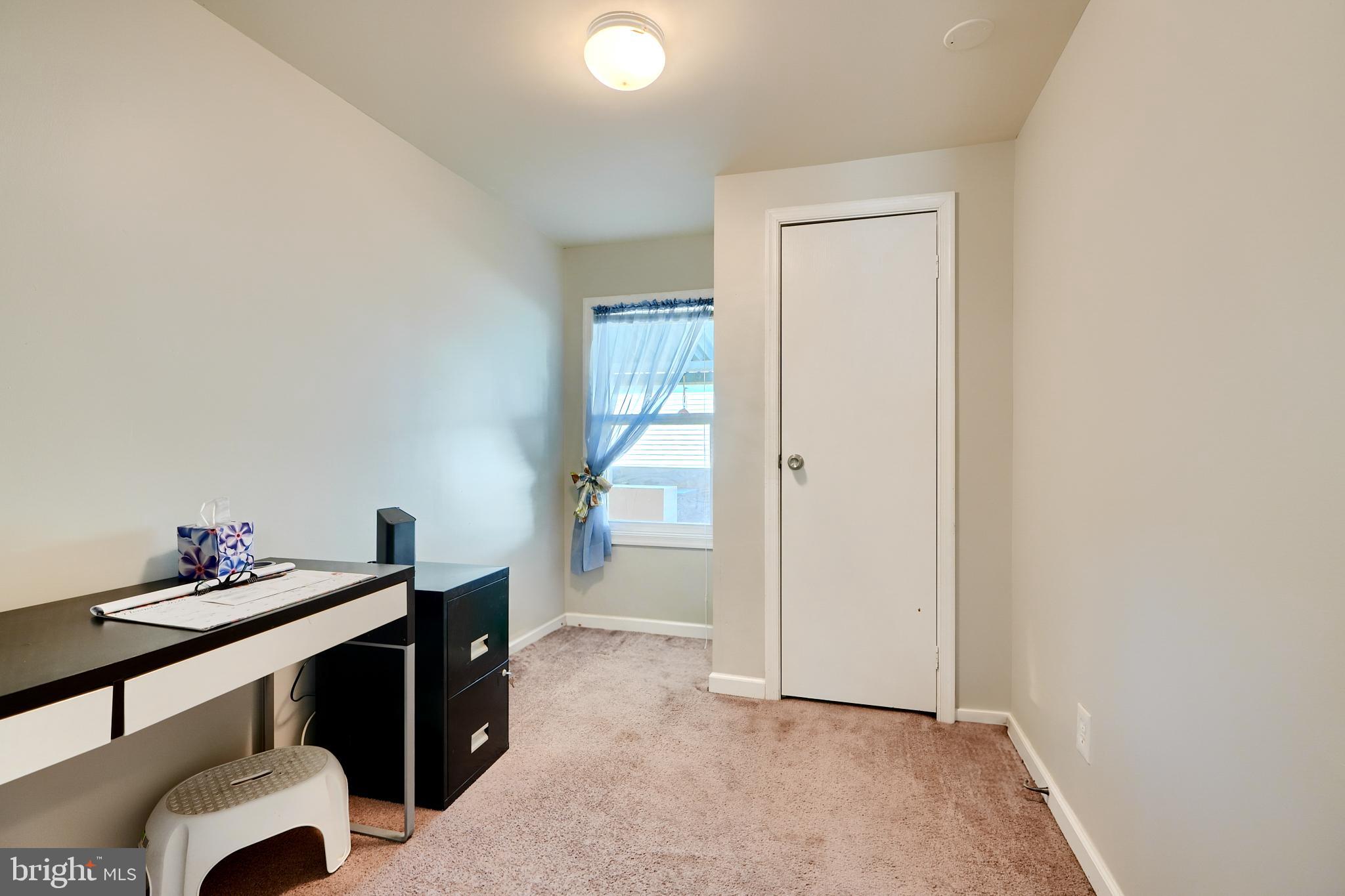 127 Cowhide Circle Baltimore, MD 21220 - Photo 14 of 27 a view of a hallway to a livingroom with furniture