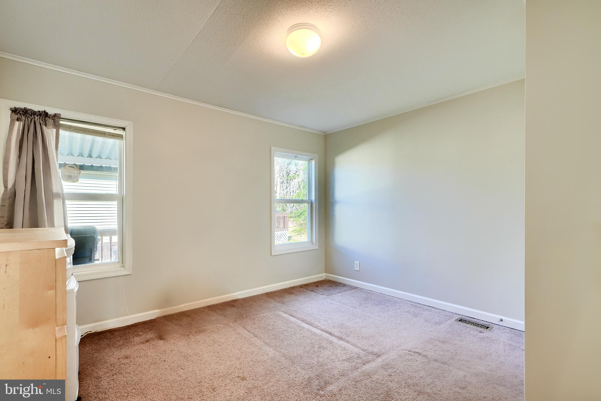 127 Cowhide Circle Baltimore, MD 21220 - Photo 16 of 27 a view of empty room with window