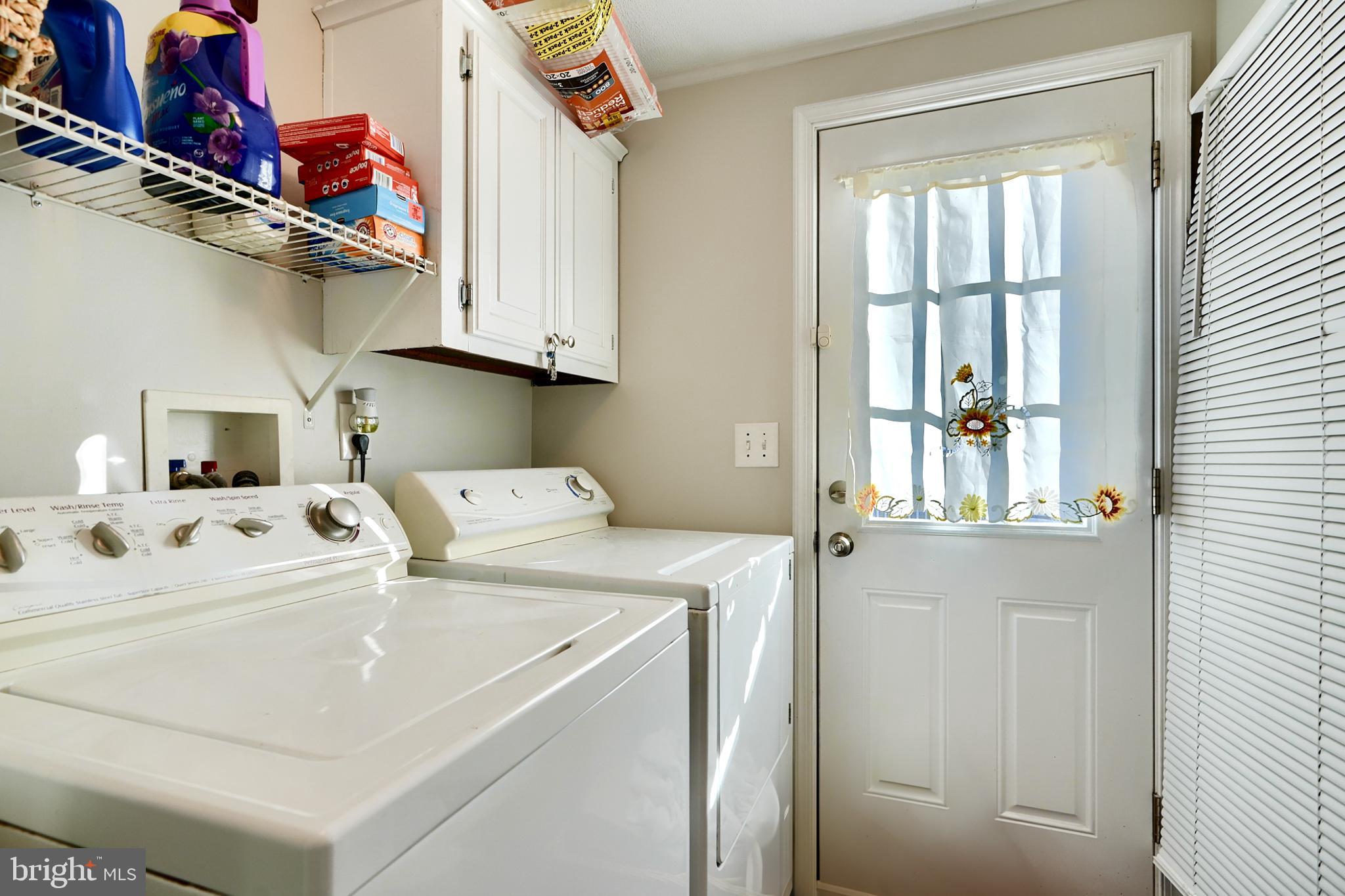 127 Cowhide Circle Baltimore, MD 21220 - Photo 18 of 27 a utility room with dryer and washer