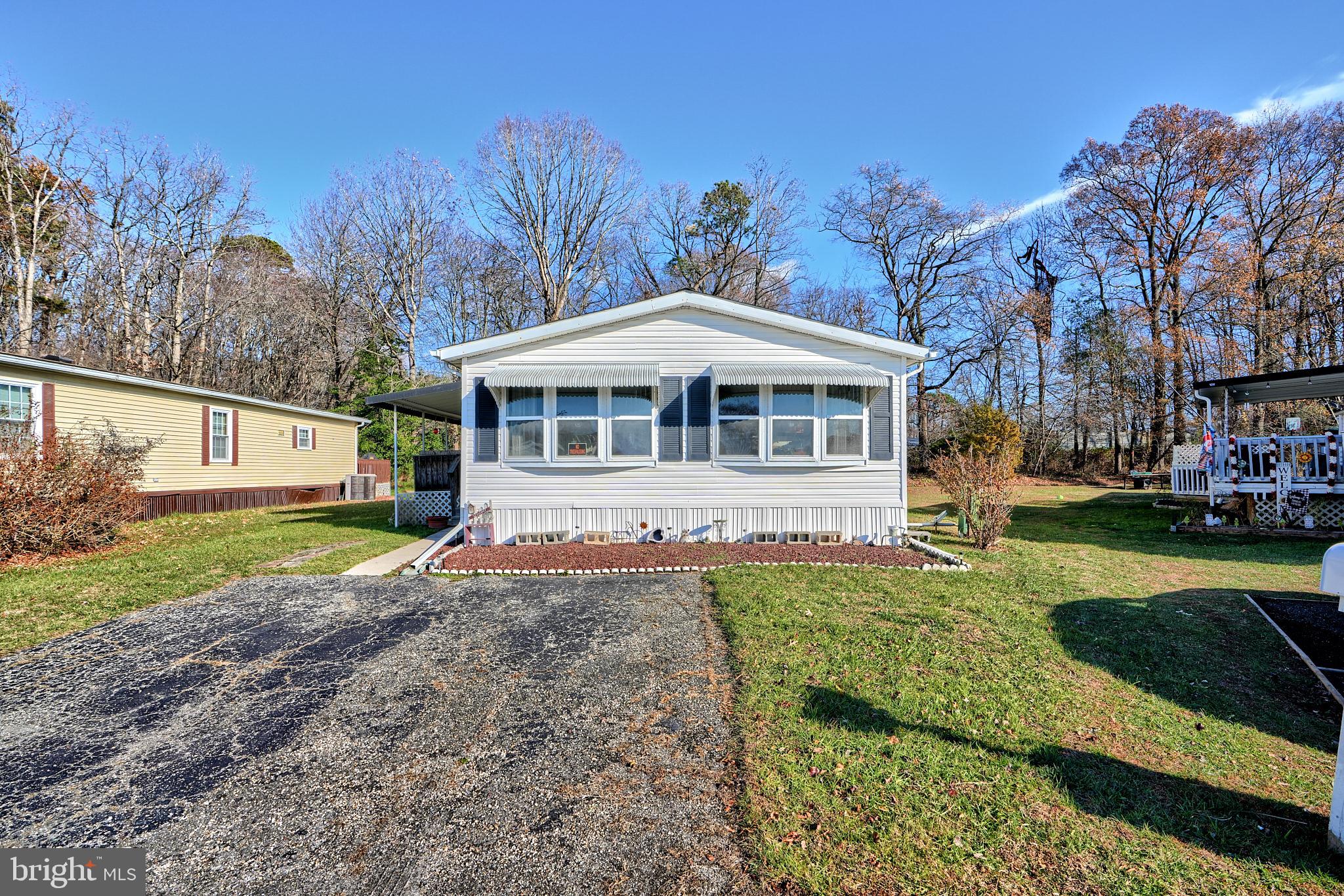 127 Cowhide Circle Baltimore, MD 21220 - Photo 2 of 27 a view of a house with a yard and sitting area