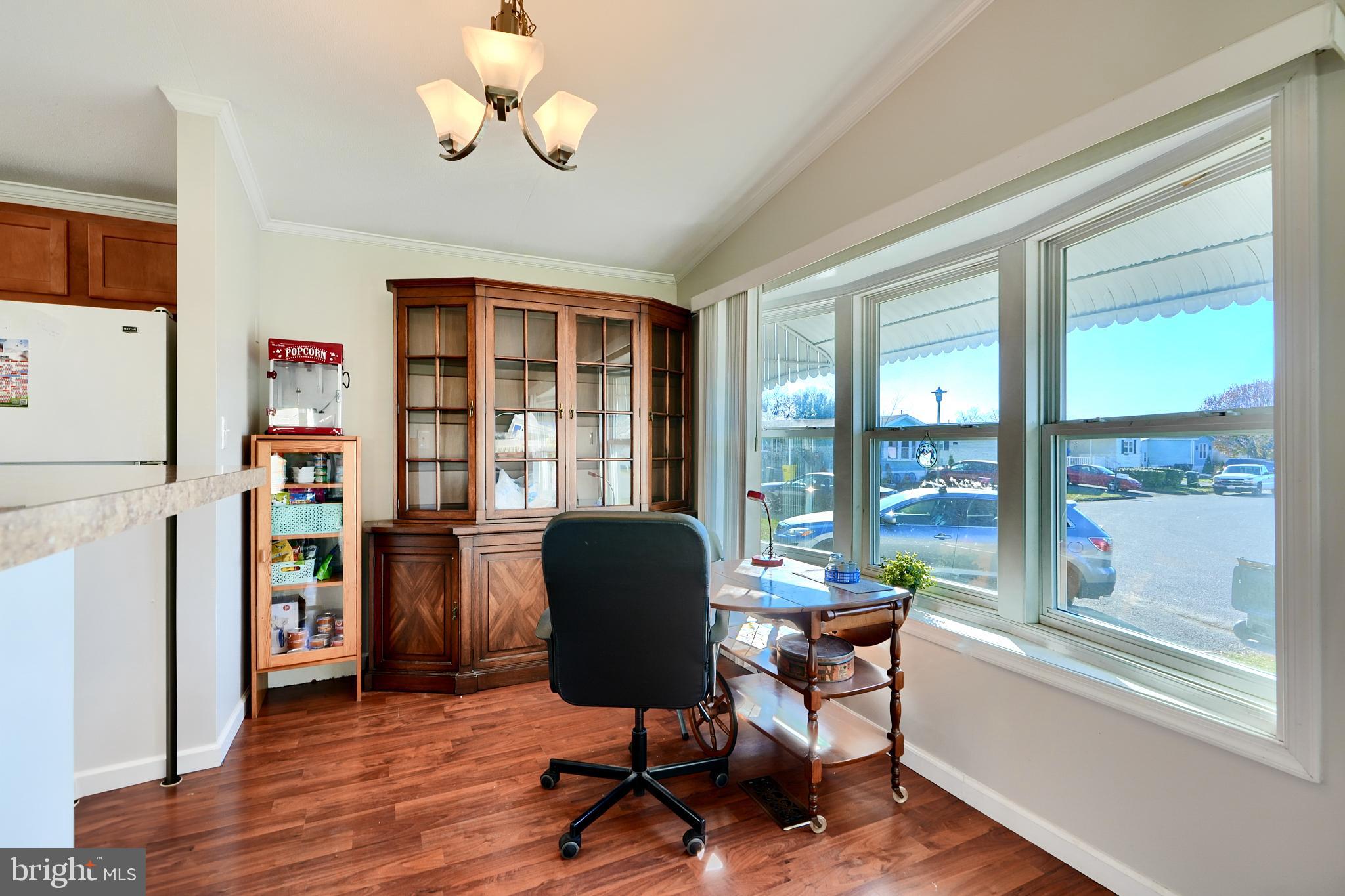 127 Cowhide Circle Baltimore, MD 21220 - Photo 8 of 27 a work room with furniture and a window