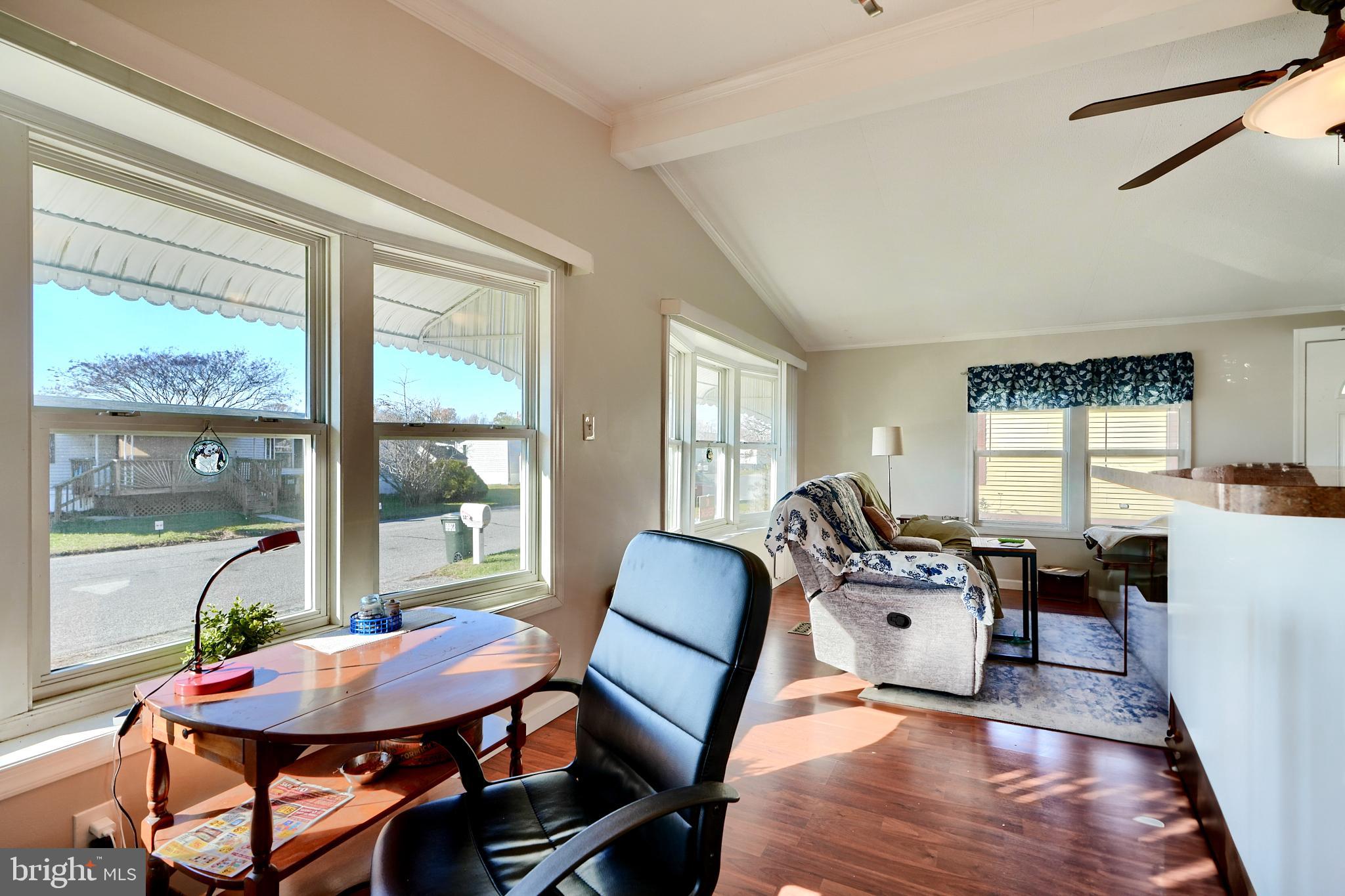 127 Cowhide Circle Baltimore, MD 21220 - Photo 9 of 27 a living room with furniture and a large window