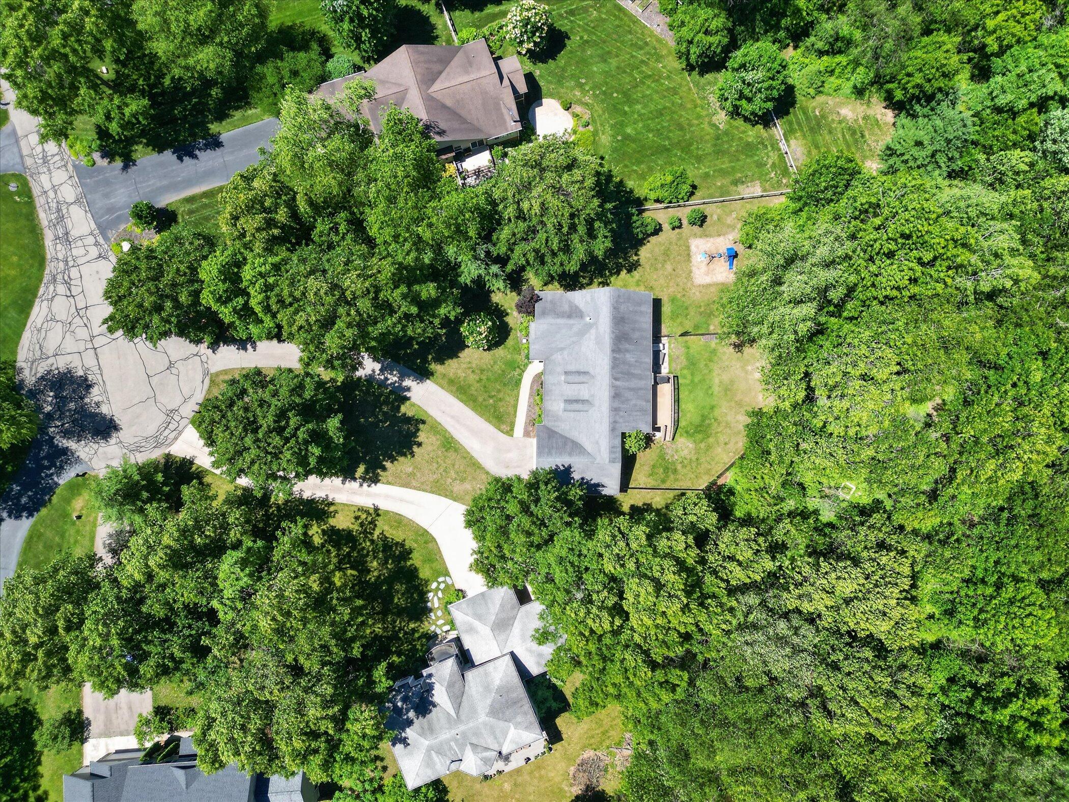 8669 Lilly Ridge Drive Alto, MI 49302 - Photo 50 of 53 55-8669-Lilly-Ridge-Dr-Alto-WindowStill