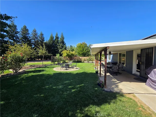 a view of a room with wooden floor and staircase