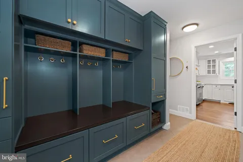 a kitchen with a sink and a stove