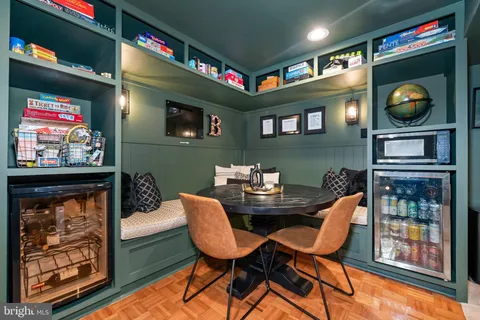 a room with furniture and a flat screen tv