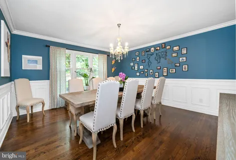 a kitchen with granite countertop a sink stove and cabinets