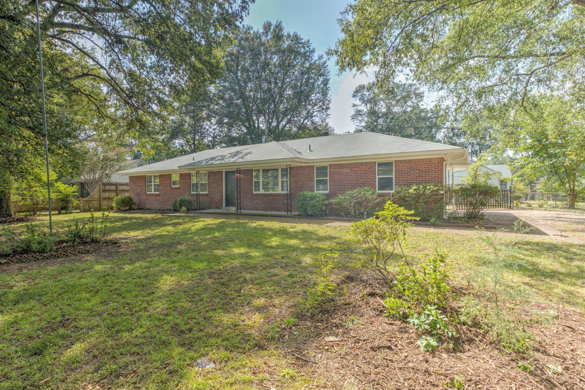 2823 Altruria Road Bartlett, TN 38134 - Photo 2 of 40 a front view of a house with a yard